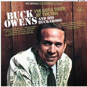 Buck Owens  - I've Got A Tiger By The Tail